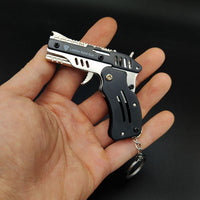 Thumbnail for Mini Folding Rubber Band Gun